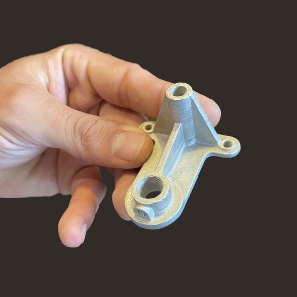 FGF Fused Granulate Fabrication FGM Fused Granulate Modeling Pollen AM bracket MIM metal stainless steel 316L 3D printing 3D printer industrial pellets granules extrusion ceramic technical