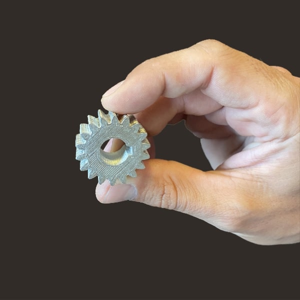 FGF Fused Granulate Fabrication FGM Fused Granulate Modeling stainless steel gear Pollen AM mim metal cim ceramic technical 3D printing 3D printer industrial pellets granules extrusion small series medium series stainless steel thermoplastic granules open to materials multi-material