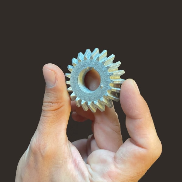 stainless steel gear Pollen AM mim metal cim ceramic technical 3D printing 3D printer industrial pellets granules extrusion small series medium series stainless steel thermoplastic granules open to materials multi-material