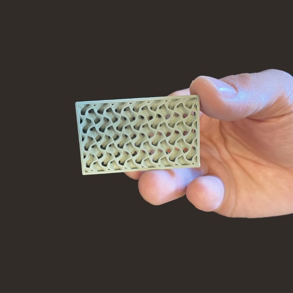 structure lattice en céramique Pollen AM mim métal cim céramique technique impression 3D imprimante 3D granulés industriels extrusion petite série moyenne série acier inoxydable granulés thermoplastiques ouvert aux matériaux multi-matériaux