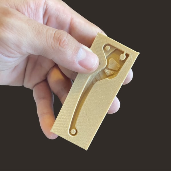 brake handle mold Pollen AM mim metal cim ceramic technical 3D printing 3D printer industrial pellets granules extrusion small series medium series stainless steel thermoplastic granules open to materials multi-material