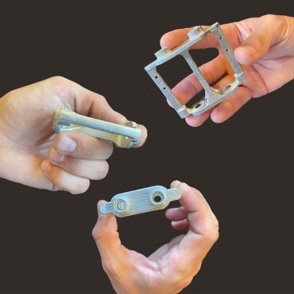 stainless steel sheath connector Pollen AM mim metal cim ceramic technical 3D printing 3D printer industrial pellets granules extrusion small series medium series stainless steel thermoplastic granules open to materials multi-material
