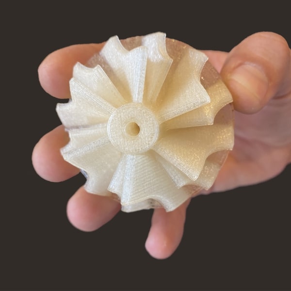 turbine pesu matériau haute performance Pollen AM mim métal cim céramique technique impression 3D imprimante 3D granulés industriels extrusion petite série moyenne série acier inoxydable granulés thermoplastiques ouvert aux matériaux multi-matériaux