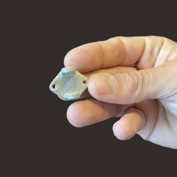 Small Stainless-steel Bracket Pollen AM mim metal cim ceramic technical 3D printing 3D printer industrial pellets granules extrusion small series medium series stainless steel thermoplastic granules open to materials